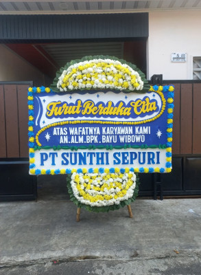 Papan Bunga Duka di Awang
