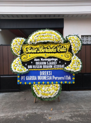 Papan Bunga Duka di Awang