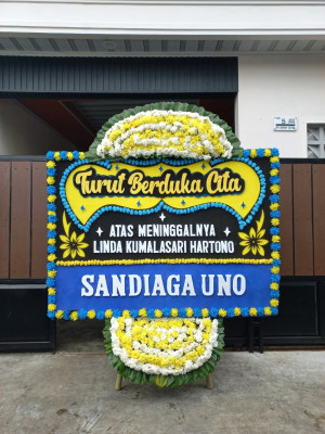 Papan Bunga Duka di Awang